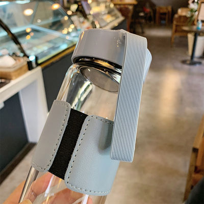 480 ml aangepaste borosilicaat glas waterfles met lederen mouw en thee-infuser